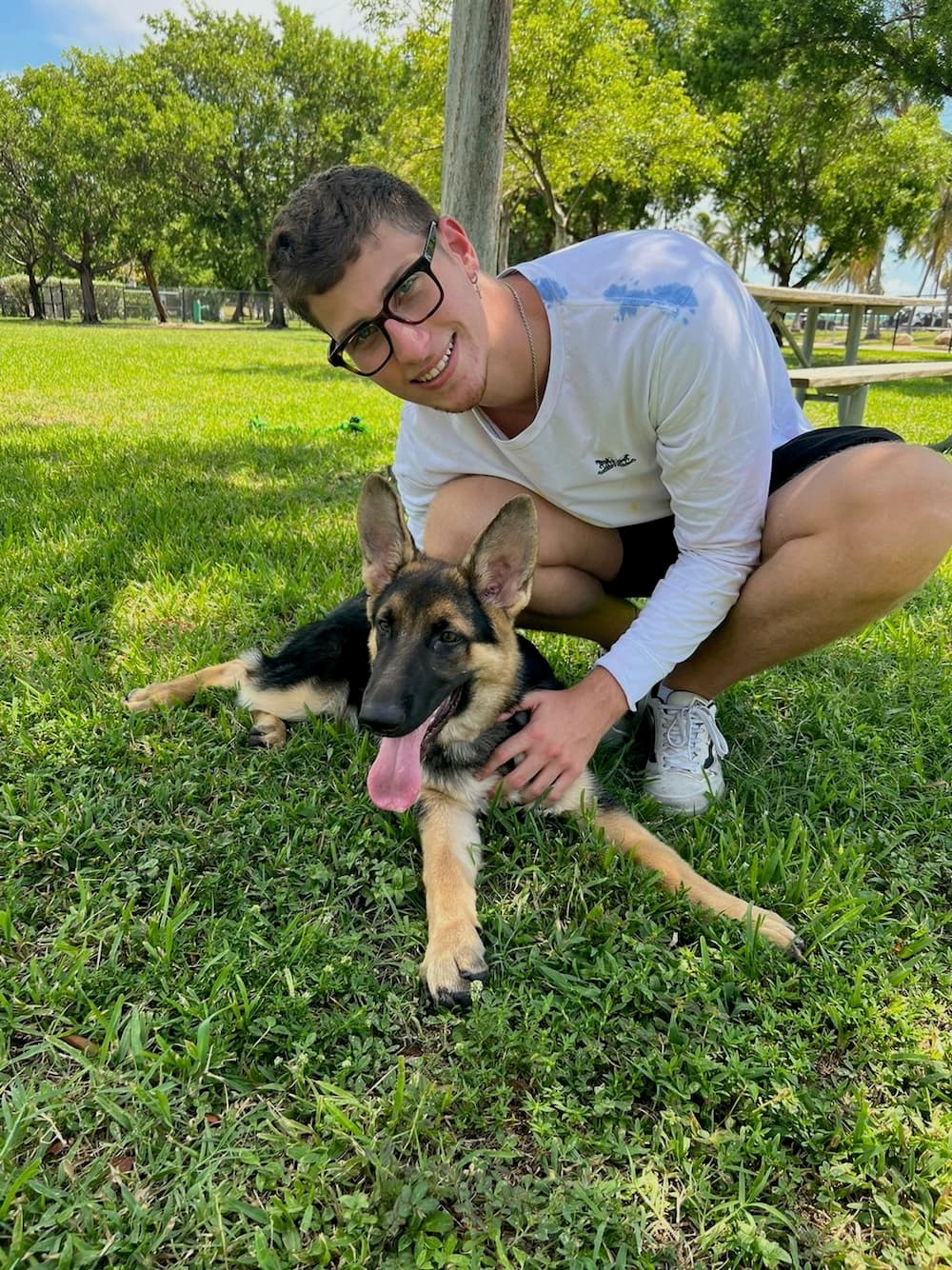 Andrea at a dog park with her pet